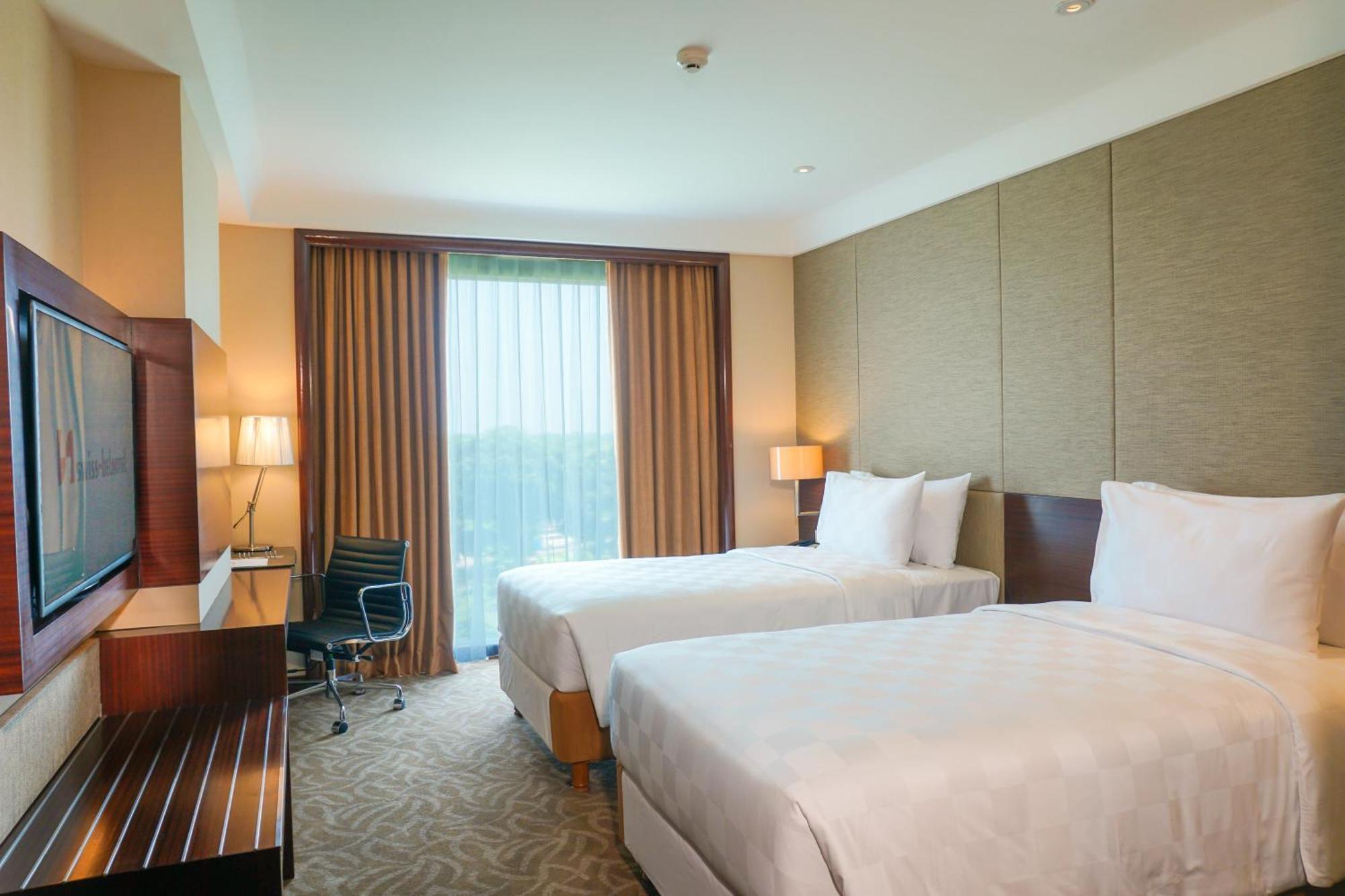 Swiss-Belhotel Serpong Zimmer foto